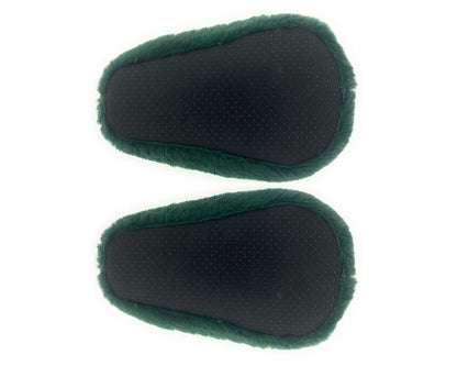 Pair of plush avocado slippers seen from the bottom, showing black fabric soles with non-slip grips, on a white background