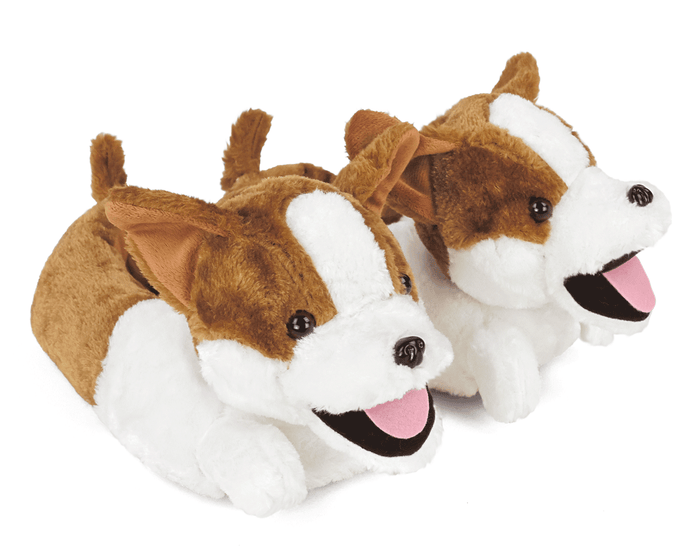 Pair of plush dog slippers with brown, white, and black color scheme on a white background.