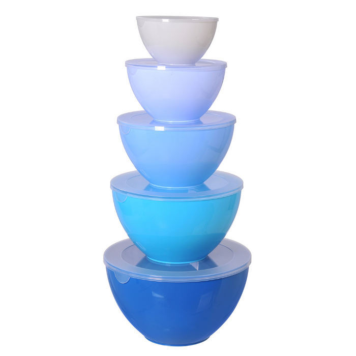 Set of five blue mixing bowls with lids on a white background