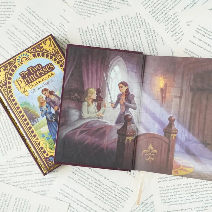 Book with a scene of two princesses in a castle room, next to the book cover titled 'The Two Princesses of Bamarre' by Gail Carson Levine.
