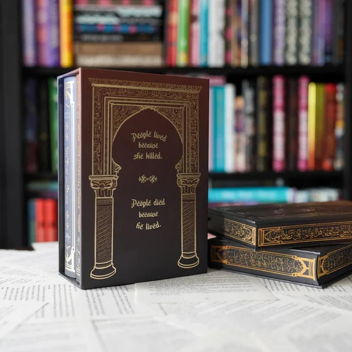 We Hunt the Flame special edition box back cover with gold quote text and arch design beside stacked box sets